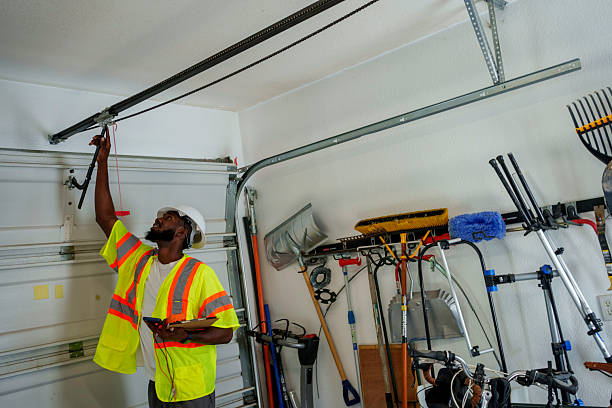 Professional Garage Door Maintenance technician working in Lake Odessa, MI